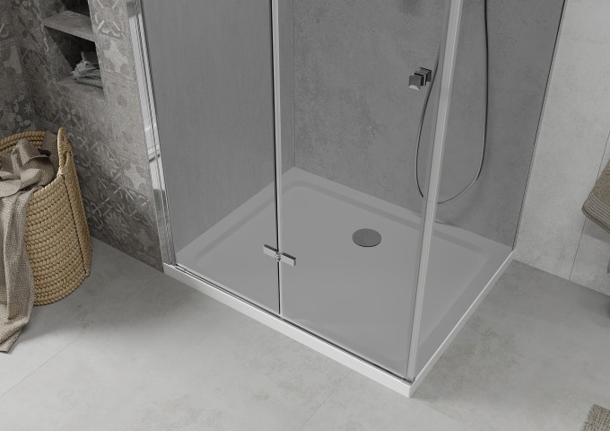 Rectangular shower tray in a small bathroom