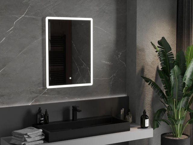 Mirror with lighting in the bathroom