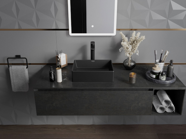 Stylish black vanity cabinet in bathroom arrangement