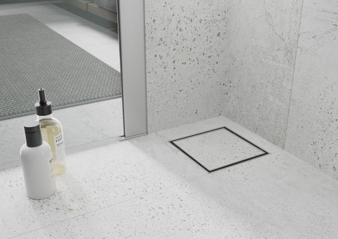 Square floor drain covered with tiles