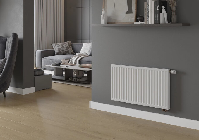Panel radiator with thermostatic head