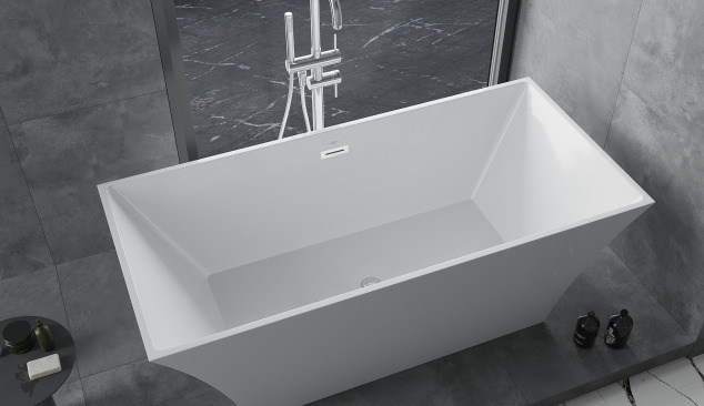 Freestanding bath with tap