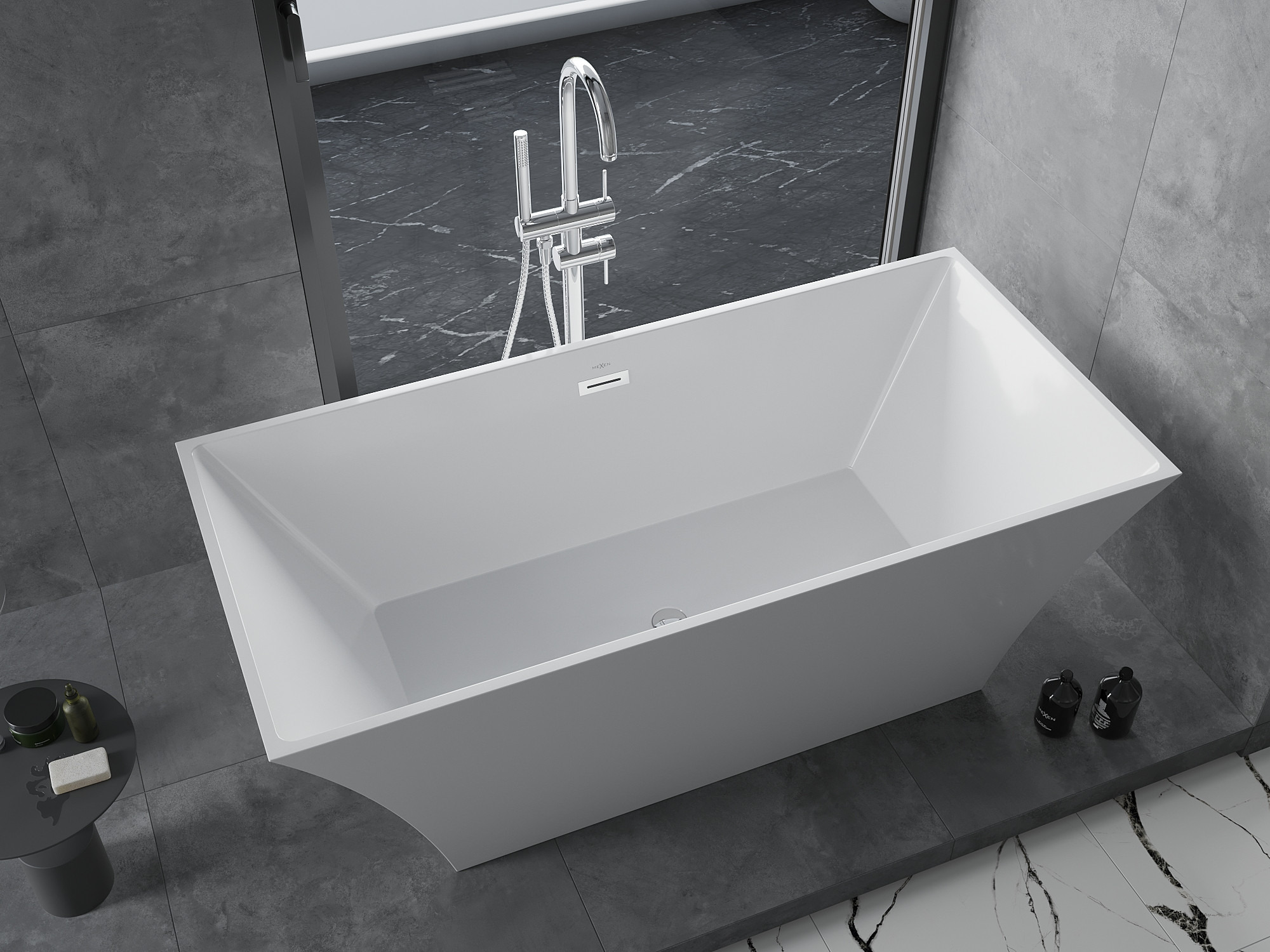 Freestanding bath with tap