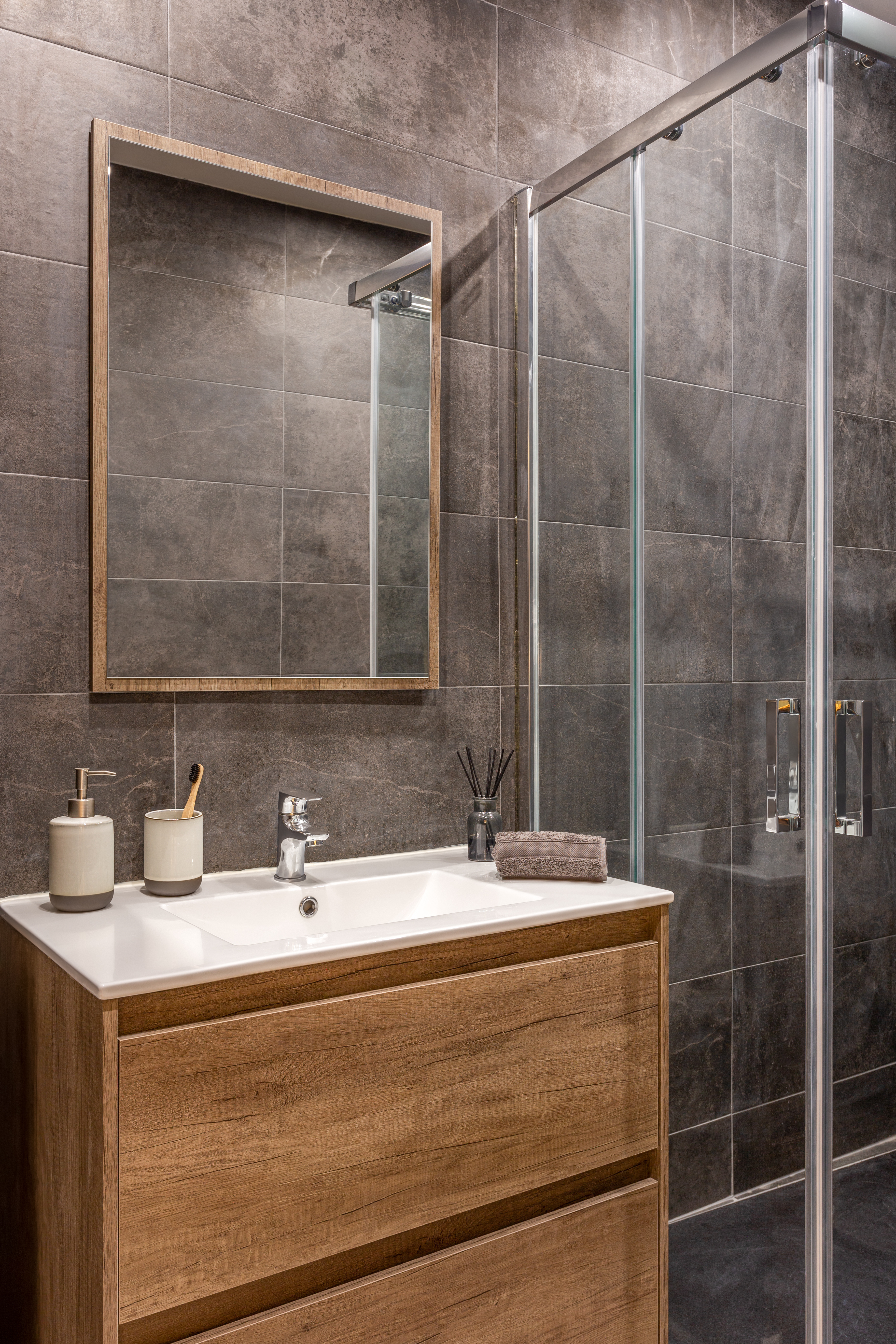 At what height should shower baskets be hung?