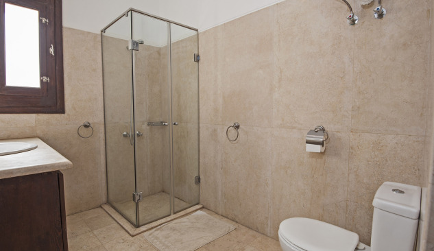 Modern bathroom - linear drain in the wall or floor?