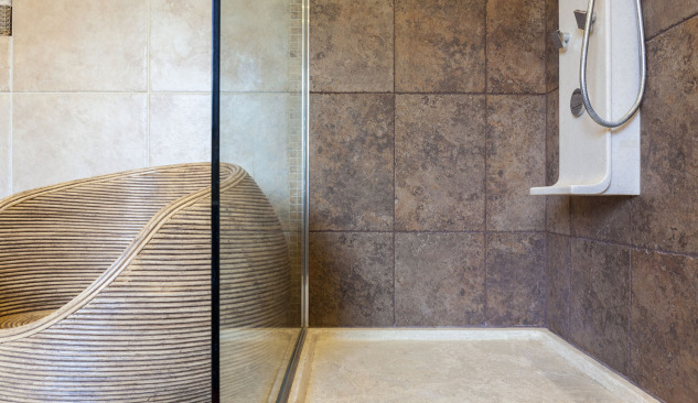 Characteristics of materials used to make shower trays