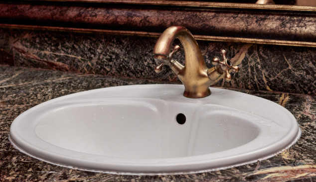 Gold and Copper Taps in the Bathroom