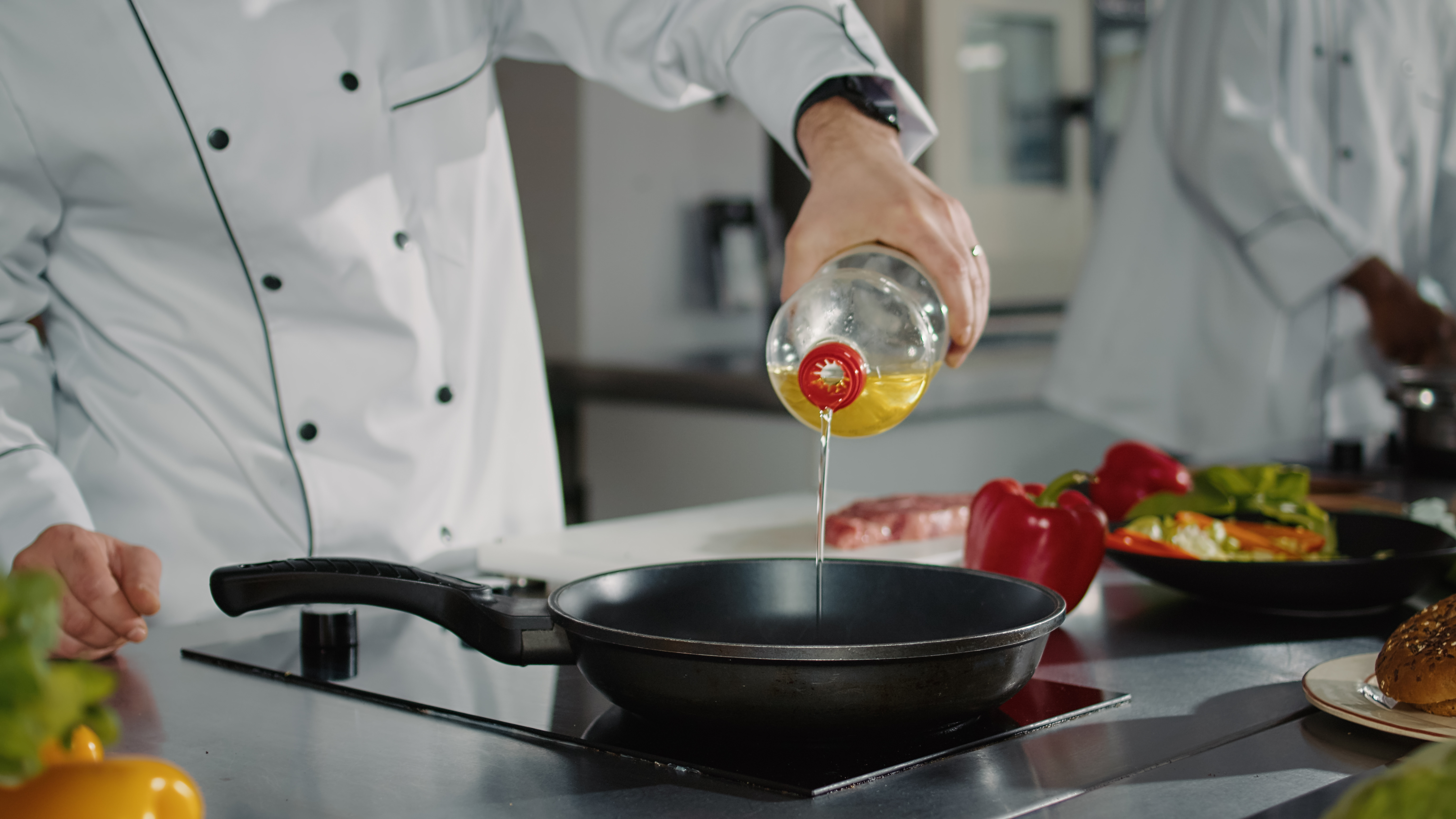 Where to pour used oil from the pan - can it go down the sink?