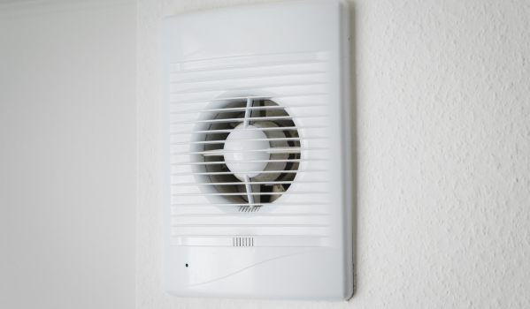 What kind of ventilation is needed in bathrooms to ensure adequate air flow?